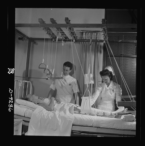 Nurse training. The nurse must learn to carry out complicated and constantly changing instructions of the doctor attending this patient who has undergone a cut arthroplasty operation