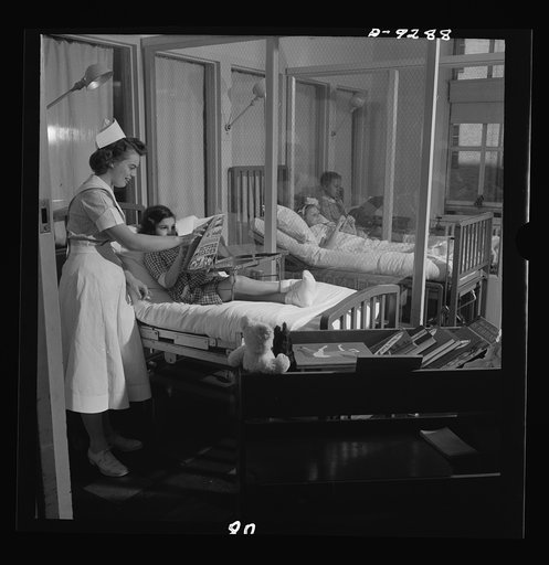 Nurse training. Student nurses must be versed in occupational therapy. This student entertains youngsters in a convalescing ward