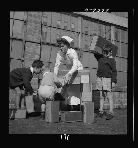 Nurse training. On the sun roof of Babies Hospital in New York City a student nurse supervises convalescing youngsters in healthful play