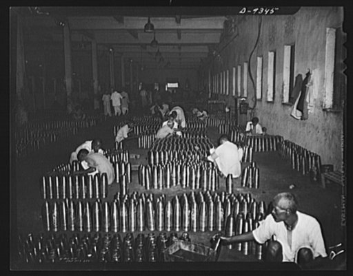 Indian industry by lend-lease. Finished show and shells are prepared for delivery from an Indian munitions factory. Skilled Indian workmen, using lend-lease machinery, have increased the shell production of this factory twenty-four times over a pre-war year