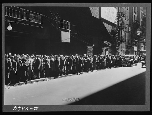 Inflation. Almost too recent and painful to recall--dark days in America's 1930 depression. Men this side of the sign are assured of a five-cent meal--the rest must wait for generous passersby