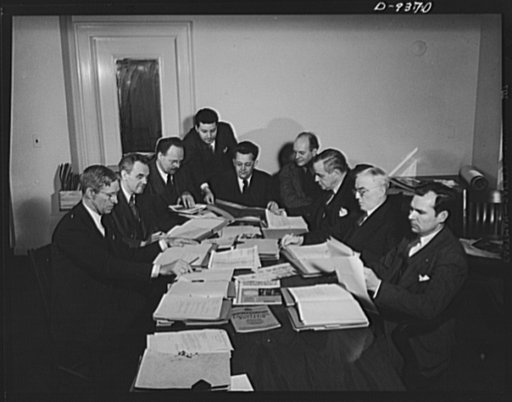 War workers' ideas. Jury votes on war workers' ideas that save man-hours and critical materials. More than 400,000 suggestions to speed war production have been submitted to suggestion committees in war plants, and the outstanding ones tested and sent through more than 2,000 War Production Drive lab