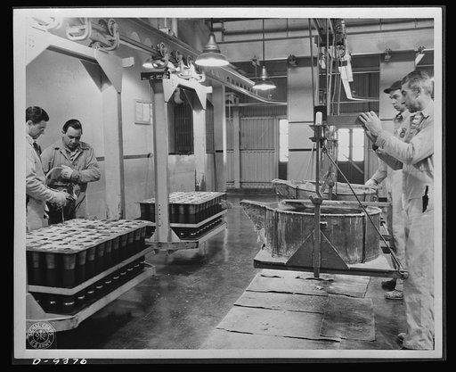 Production. Shell loading. Molten TNT is poured into 75 mm. shells at a large Midwest loading plant. Shells from 20 mm. to 155 mm. are loaded at this plant in addition to special shells required by the British. Ravenna ordnance plant