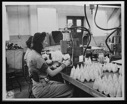 Production. Shell loading. These girls are "staking" fuses in the assembly of artillery shells in a large Midwest loading plant. In the manufacture and loading of percussion caps--an operation performed in a large division of the plant--ninety percent of the employees are women. Army officers say th
