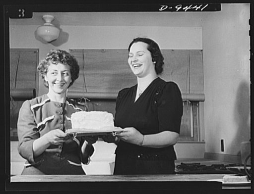 Wartime food demonstration. Winners of the butterless, sugarless cake made at a wartime food demonstration were, Mrs. Victor Brusher and Mrs. M.L. Cuadle, both of Alexandria, Virginia. Attending all such meetings held at the housing settlement where they live, both women have found the demonstration
