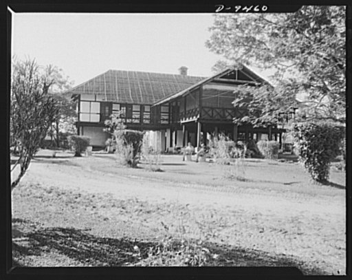An American flying squadron in India. "Hump Happy Tavern." Looming like any other bungalow in the surrounding country but serving as living quarters for a group of American pilots of the India-China Ferry Command. A group of lads who believe "you can't take it with you" and so live day by day