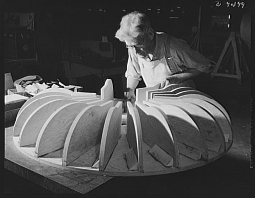 Production. BT-13A ("Valiant") basic trainers. A white-haired woodworker gives his skill to the production of "Valiant" basic trainers at Vultee's Downey, California plant. At the Downey plant is made the BT-13A ("Valiant") basic trainer--a fast, sturdy ship powered by a Pratt and Whitney Wasp engin