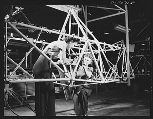 Production. BT-13A ("Valiant") basic trainers. Girls on the final assembly line at Vultee's Downey, California plant working on the fuselage of a "Valiant" basic trainer. At the Downey plant is made the BT-13A ("Valiant") basic trainer--a fast, sturdy ship powered by a Pratt and Whitney Wasp engine