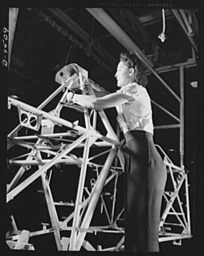 Production. BT-13A ("Valiant") basic trainers. A woman employee at Vultee's Downey, California plant works on a fuselage frame for a "Valiant" basic trainer. At the Downey plant is made the BT-13A ("Valiant") basic trainer--a fast, sturdy ship powered by by a Pratt and Whitney Wasp engine