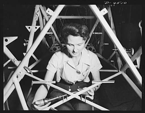 Production. BT-13A ("Valiant") basic trainers. Woman working on the fuselage of a "Valiant" basic trainer in the final assembly line at Vultee's Downey, California plant. At the Downey plant is made the BT-13A ("Valiant") basic trainer--a fast, sturdy ship powered by a Pratt and Whitney Wasp engine