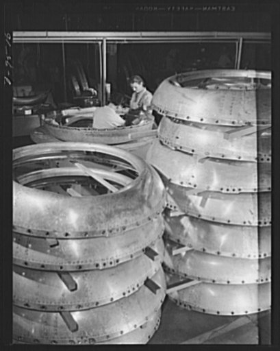 Production. BT-13A ("Valiant") basic trainers. Motor rings for "Valiant" basic trainers at Vultee's Downey, California plant. At the Downey plant is made the BT-13A ("Valiant") basic trainer--a fast, sturdy ship powered by a Pratt and Whitney Wasp engine