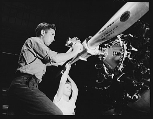 Production. BT-13A ("Valiant") basic trainers. Installation of the propellor of a "Valiant" basic trainer on the Vultee assembly line at Downey, California. Propellors are Hamiltons. At the Downey plant is made the BT-13A ("Valiant") basic trainer--a fast, sturdy ship powered by a Pratt and Whitney 