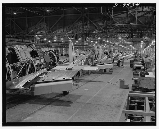 Production. BT-13A ("Valiant") basic trainers. Final "Valiant" basic trainer assembly line at Vultee's Downey, California plant. At the Downey plant is made the BT-13A ("Valiant") basic trainer--a fast, sturdy ship powered by a Pratt and Whitney Wasp engine