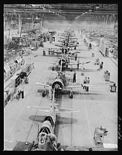 Production. BT-13A ("Valiant") basic trainers. Final "Valiant" basic trainer assembly line at Vultee's Downey, California plant. At the Downey plant is made the BT-13A ("Valiant") basic trainer--a fast, sturdy ship powered by a Pratt and Whitney Wasp engine