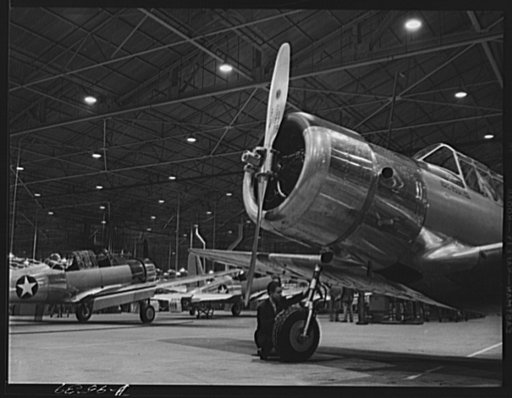 Production. BT-13A ("Valiant") basic trainers. Inspecting trainer landing gear at Vultee's Downey, California plant. At the Downey plant is made the BT-13A ("Valiant") basic trainer--a fast, sturdy ship powered by a Pratt and Whitney Wasp engine
