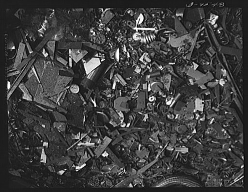 Production. BT-13A ("Valiant") basic trainers. Scrap metal at Vultee's Downey, California plant. At the Downey plant is made the BT-13A ("Valiant") basic trainer--a fast, sturdy ship powered by a Pratt and Whitney Wasp engine