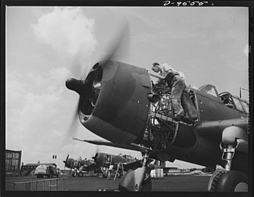 Production. A-31 ("Vengeance") dive bombers. Carburetor adjustment. A flight service mechanic is shown here making adjustments on the carburetor of a "Vengeance" dive bomber manufactured at Vultee's Nashville Division. The "Vengeance" (A-31) was originally designed for the French. It was later adopt