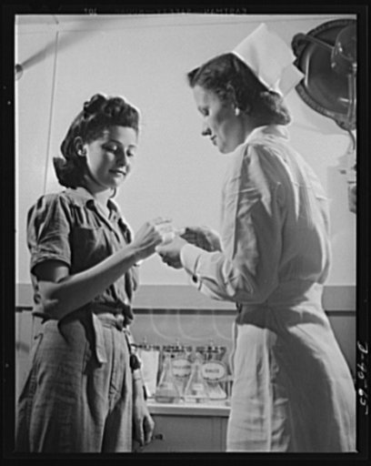 Production. A-31 ("Vengeance") dive bombers. First aid. Full-time plant nurse redressing the finger of a Vultee woman worker in the First Aid Station at Vultee's Nashville plant where the "Vengeance" dive bomber is manufactured. The "Vengeance" (A-31) was originally designed for the French. It was l