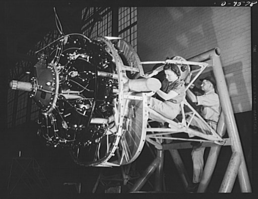 Production. A-31 ("Vengeance") dive bombers. Oil tank installation. Vultee workers are shown installing an oil tank behind the engine firewall on the sub-assembly engine mounting. This Wright "double cyclone" engine powers the "Vengeance" dive bomber made at Vultee's Nashville Division. The "Vengean