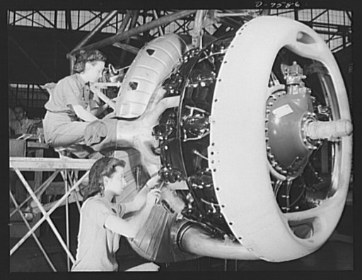 Production. A-31 ("Vengeance") dive bombers. Installation of exhaust-collector ring. Two women employees at the Nashville Division of Vultee Aircraft Inc. are shown installing the exhaust-collector ring on a motor which will go into a Vultee "Vengeance" dive bomber. The "Vengeance" (A-31) was origin