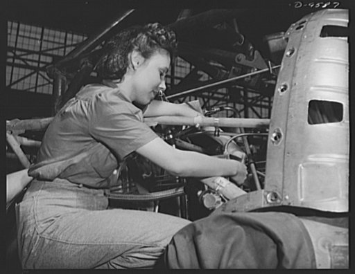 Production. A-31 ("Vengeance") dive bombers. Electrical installation. This photogenic girl worker at Vultee-Nashville is shown making an electrical installation, an important step in the assembly of the Vultee "Vengeance" dive bomber. The "Vengeance" (A-31) was originally designed for the French. It