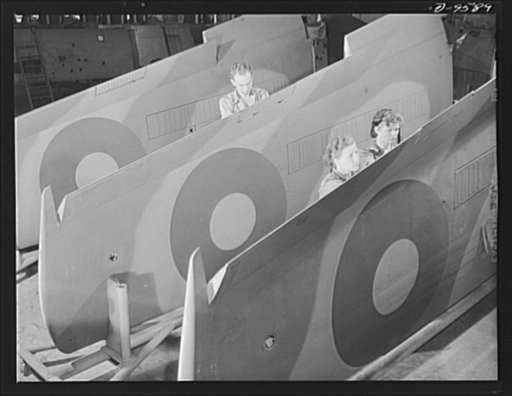 Production. A-31 ("Vengeance") dive bombers. Flap installation. These workers at Vultee's Nashville plant are making flap installations on a row of outer wings which will subsequently be installed on Vultee "Vengeance" dive bombers. The "Vengeance" (A-31) was originally designed for the French. It w