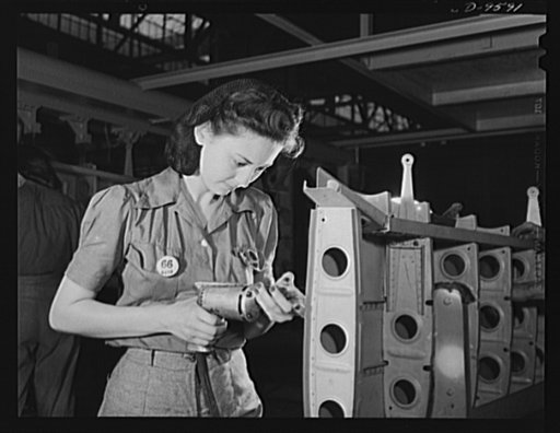 Production. A-31 ("Vengeance") dive bombers. Drilling horizontal stabilizers. Creating a hand drill, this woman worker at Vultee-Nashville is shown working on the horizontal stabilizer for a Vultee "Vengeance" dive bomber. The "Vengeance" (A-31) was originally designed for the French. It was later a
