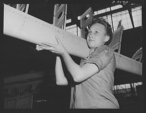 Production. A-31 ("Vengeance") dive bombers. Horizontal stabilizer frame. This woman worker at the Nashville Division of Vultee Aircraft Inc. is shown carrying a horizontal stabilizer frame which will be used in building a Vultee "Vengeance" dive bomber. The "Vengeance" (A-31) was originally designe