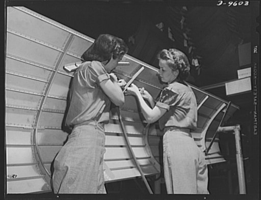 Production. A-31 ("Vengeance") dive bombers. Riveting an aft section assembly. Two women workers are teamed up on a riveting job on an aft section assembly which will go into the Vultee "Vengeance" dive bomber, now in full production at the Nashville Division of Vultee Aircraft Inc. The "Vengeance" 