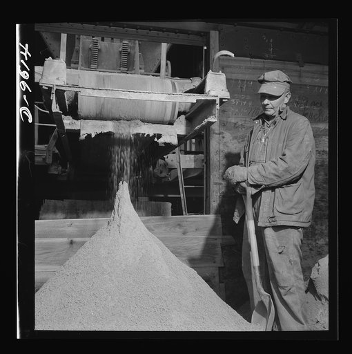 Production. Zinc. Zinc concentrate flows from a belt conveyor at a large concentrator plant. From the Eagle-Picher plant near Cardin, Oklahoma, come great quantities of zinc and lead to serve many important purposes in the war effort