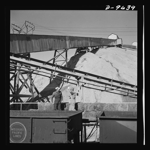 Production. Zinc. A mountain of waste rock grows steadily outside a zinc concentrator. From the Eagle-Picher plant near Cardin, Oklahoma, come great quantities of zinc and lead to serve many important purposes in the war effort