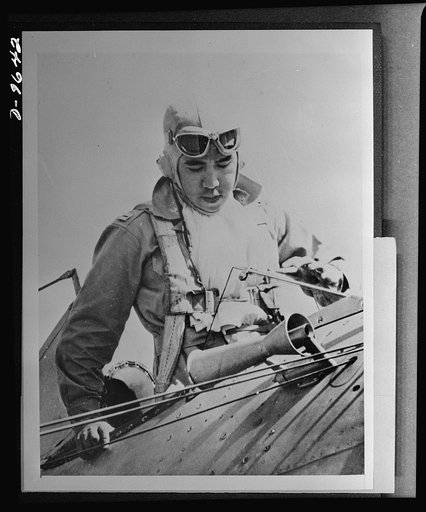 Fighting Filipino pilot. Manila. Captain Jesus Villamor, commanding officer of the 6th Pursuit Squadron, Philippine Army Air Corps, is pictured getting out of plane after returning from a flight to Batangas Field. The youth, who leads a daredevil squadron of six Filipino pilots in erstwhile training