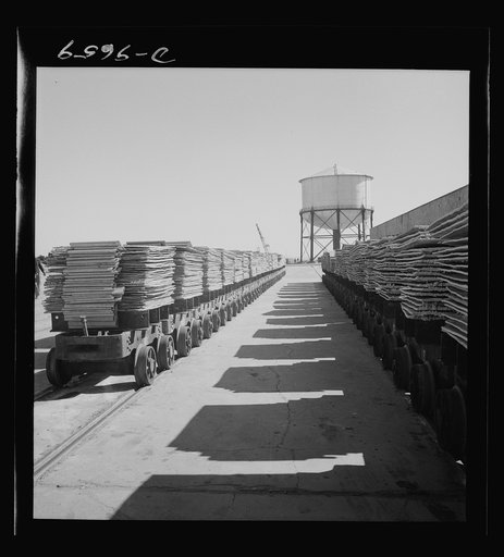 Production. Copper (refining). Sheets of copper produced by electrolysis at a large refining operation. These will be melted and cast into ingots. Large amounts of copper are produced for the war effort at the El Paso, Texas plant of Phelps-Dodge Refining Company