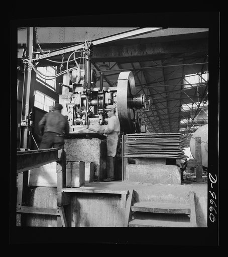 Production. Copper (refining). Shearing sheets of copper produced by electrolysis at a large refining operation. Large amounts of copper are produced for the war effort at the El Paso, Texas plant of Phelps-Dodge Refining Company