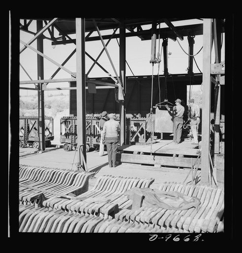 Production. Copper (refining). Sheets of copper produced by electrolysis at a large refining operation. These will be melted and cast into ingots. Large amounts of copper are produced for the war effort at the El Paso, Texas plant of Phelps-Dodge Refining Company