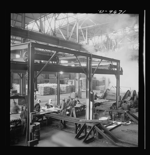 Production. Copper (refining). Copper ingots on conveyors at a large copper refining operation. Large amounts of copper are produced for the war effort at the El Paso, Texas plant of Phelps-Dodge Refining Company