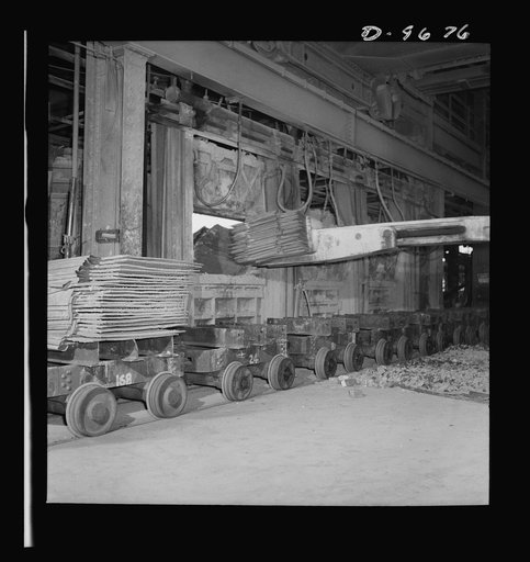 Production. Copper (refining). Charging sheets of copper produced by electrolysis into a furnace at a large copper refining operation. Large amounts of copper are produced for the war effort at the El Paso, Texas plant of Phelps-Dodge Refining Company