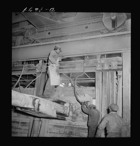Production. Copper (refining). Charging sheets of copper produced by electrolysis into a furnace at a large copper refining operation. Large amounts of copper are produced for the war effort at the El Paso, Texas plant of Phelps-Dodge Refining Company