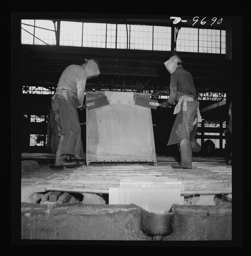 Production. Copper (refining). Sheets of copper produced by electrolysis at a large refining operation. These will be melted and cast into ingots. Large amounts of copper are produced for the war effort at the El Paso, Texas plant of Phelps-Dodge Refining Company