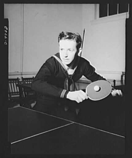 War workers. Social activities.  A sailor enjoys table tennis at the USO (United Service Organization) center in Washington, D.C.
