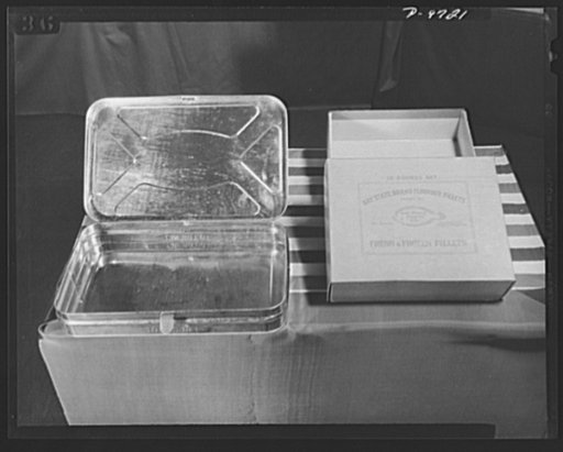 Hundreds of tons of critically needed metal have been saved for the war effort by means of these substantially paperboard boxes which give perfect protection to both fresh and frozen fish fillets, which are an important item during the war