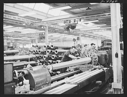 Production. 105 mm. howitzer. Turning a 105 mm. howitzer on a lathe at the Milwaukee, Wisconsin plant of Chain Belt Company