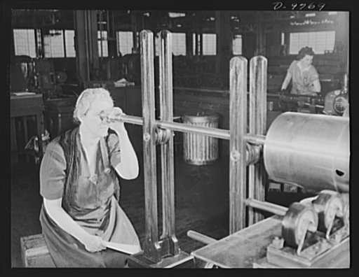 Production. 105 mm. howitzers. Norma K. Jones used to be a high school teacher and now teaches two nights a week. She inspects 105 mm. howitzers at the Milwaukee, Wisconsin plant of Chain Belt Company