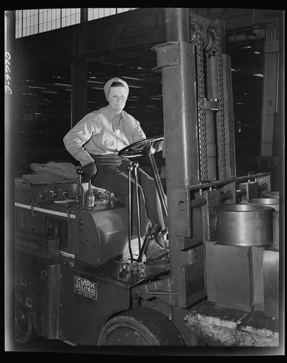 Production. 105 mm. howitzers. Kyrtle Kaczor, whose husband is also a war worker, works as a jeep driver in the Milwaukee, Wisconsin plant of Chain Belt Company