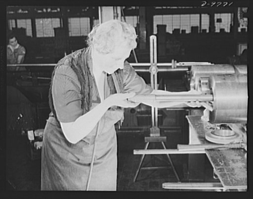 Production. 105 mm. howitzers. Testing a 105 mm. howitzer in the Milwaukee, Wisconsin plant of Chain Belt Company