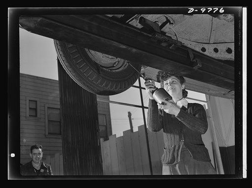 Women in essential services. Formerly a salesgirl, librarian, and sixth-grade school teacher, Grace Northrup, of San Francisco, has been repairing and serving cars for the past six months. She's becoming an expert in this field once open only to men