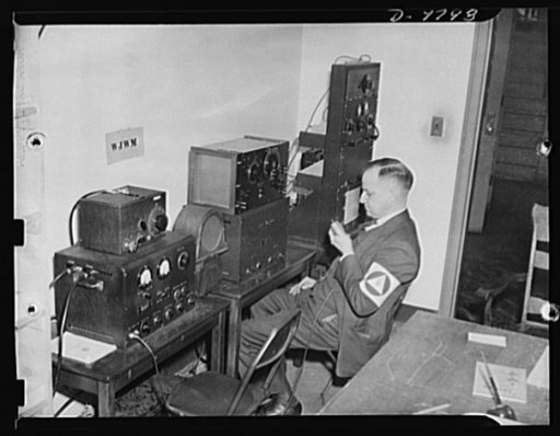 Civilian defense. War Emergency Radio Service. These three War Emergency Radio Service transmitter-receivers tuned to different wave lengths keep this Civilian Defense control center in touch with three different channels of communication. The set being operated maintains contact with state and city