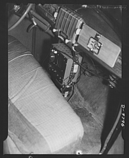 Civilian defense. War Emergency Radio Service. Commercial short wave radio transmitter are made into mobile two-way War Emergency Radio Service sets for Civilian Defense by patriotic radio "hams" who not only install and operate the sets, but frequently contribute their own equipment. Powered by the