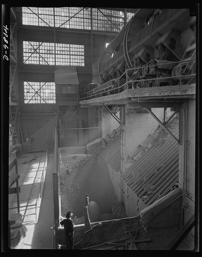 Production. Copper. A rotary car dumper drops the ore into the grizzlies, the larger sizes of ore sliding into the gyratory crusher at the Magna mill of the Utah Copper Company