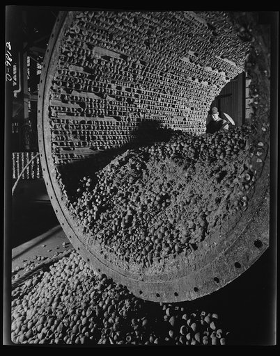 Production. Copper. Interior of large ball mill showing the iron balls which grind the ore to a fine size for subsequent treatment by flotation at one of the mills of the Utah Copper Company in Magna and Arthur in Utah